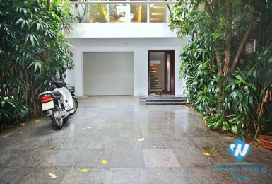 Semi-furnished 4 bedrooms house with big yard for rent in Tay Ho ward, Ha Noi